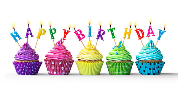 Coloridos cupcakes de cumpleaños en blanco Imagen De Stock